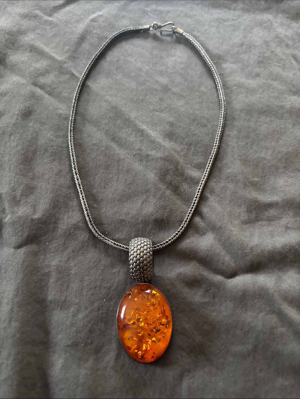 Lori Bonn Sterling chain with amber and sterling pendant.